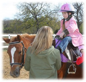 THERAPEUTIC RIDING PICTURE WOMAN AND GIRL